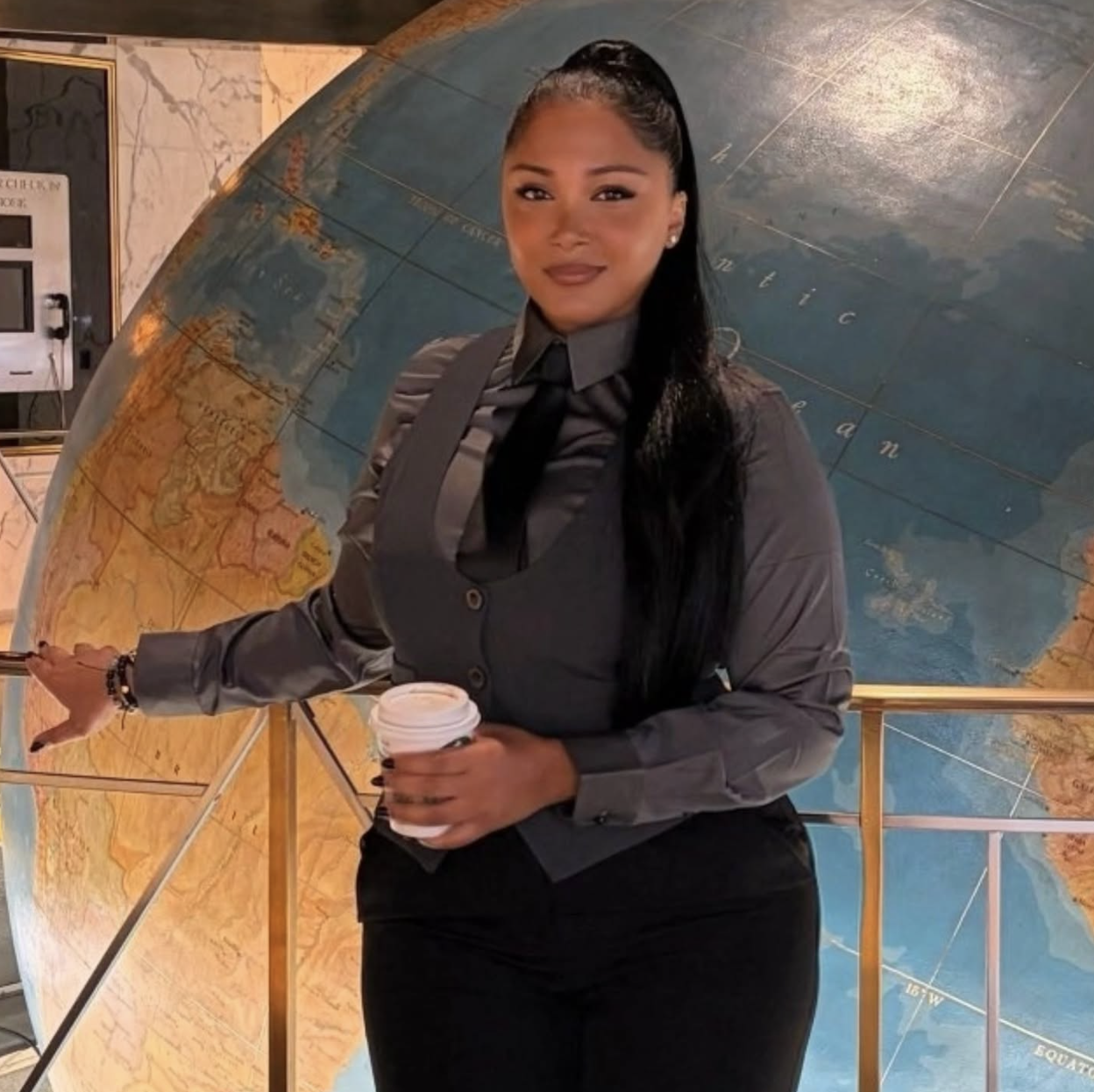 Jasmine Ray seated at an event